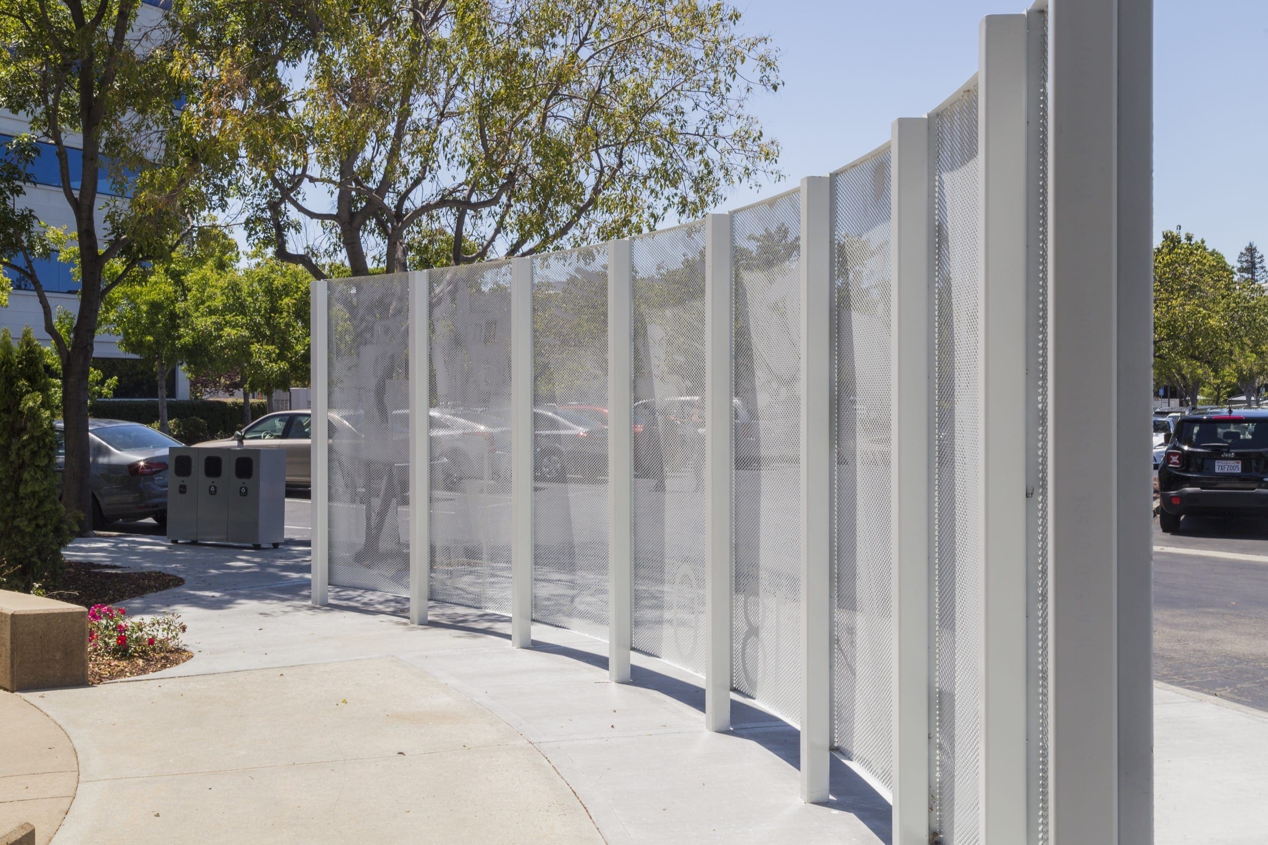 Curved free-standing ImageWall screen in painted aluminum for 1850 Gateway Courtyard.