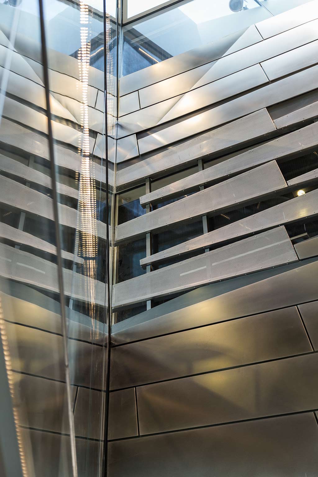 Detail of the shaded perforated metal panel system at Cornell's Science Center.