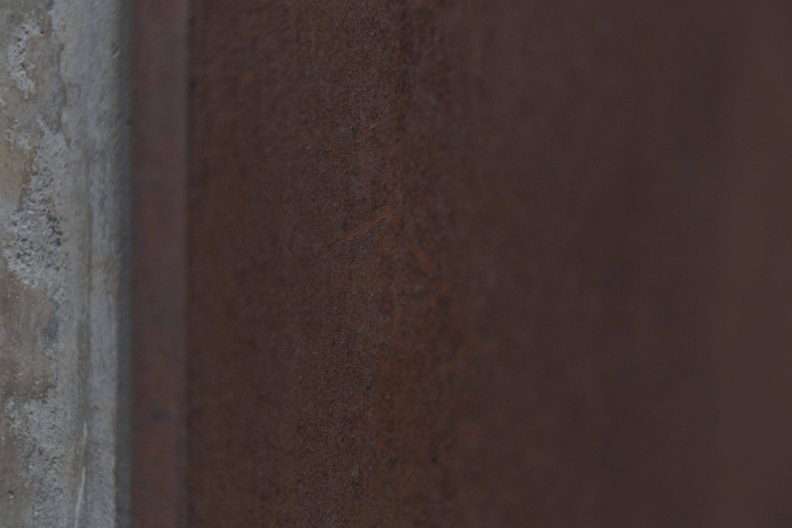 Scratches to metal surface will self-heal as part of the Solanum Steel alloy's weathering properties.