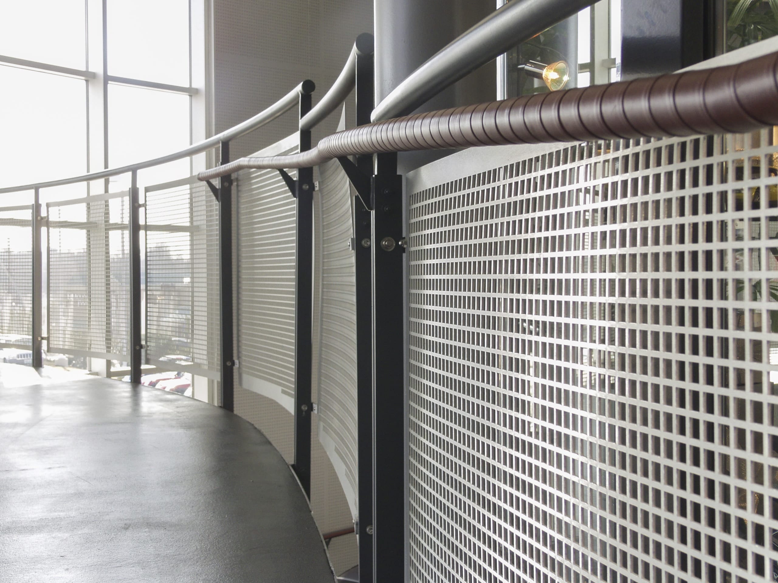 Handrail screens with custom perforations in aluminum