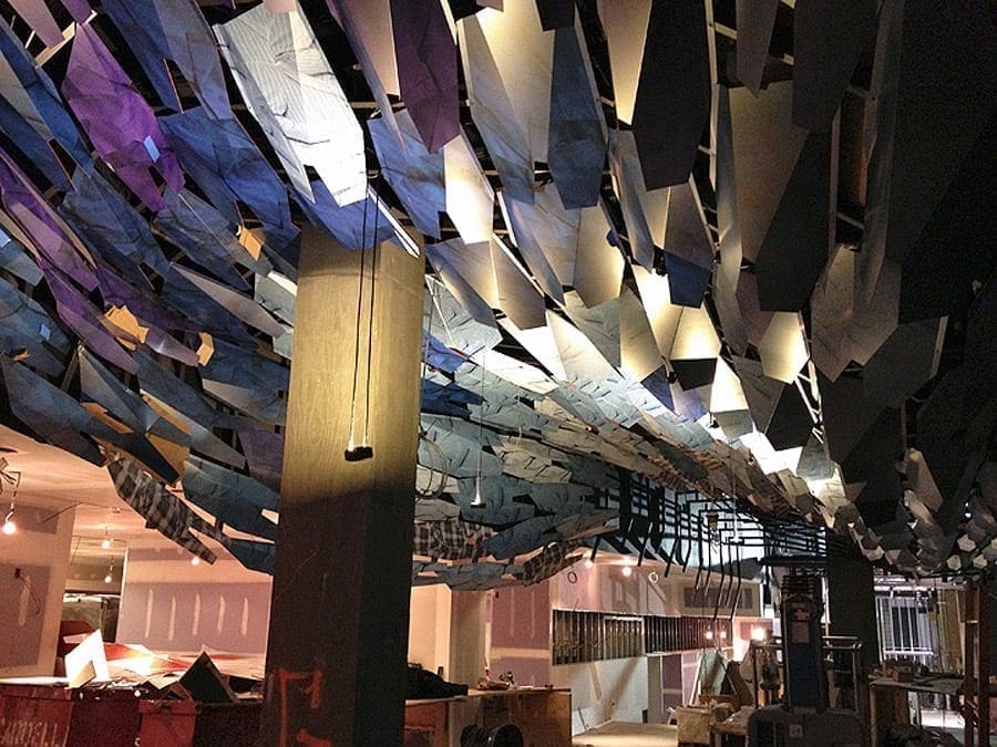 Installation process at Clyde Frazier's Wine and Dine