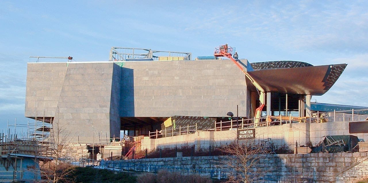 View of the awning, partially clad in its finished stainless steel surface.