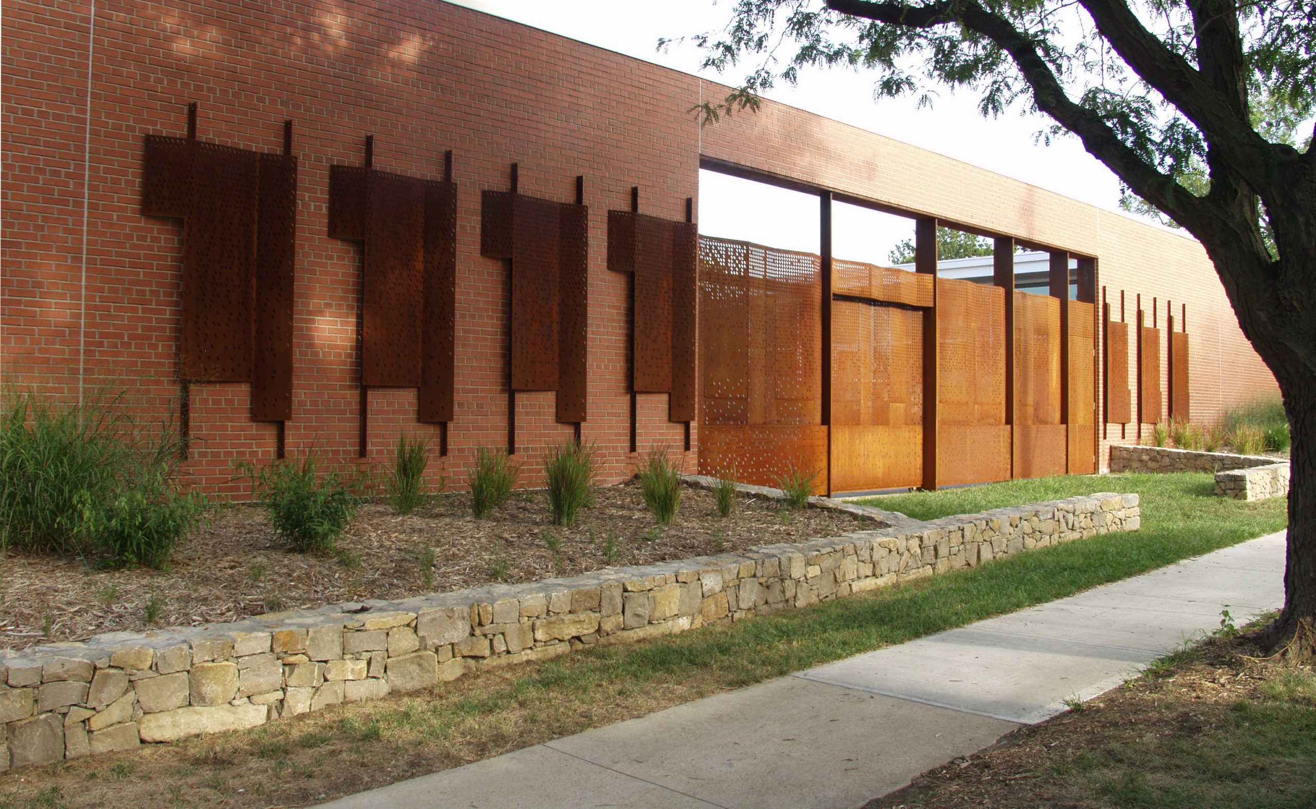Exterior view of the perforated metal gateway entry for Kansas City Art Institute.