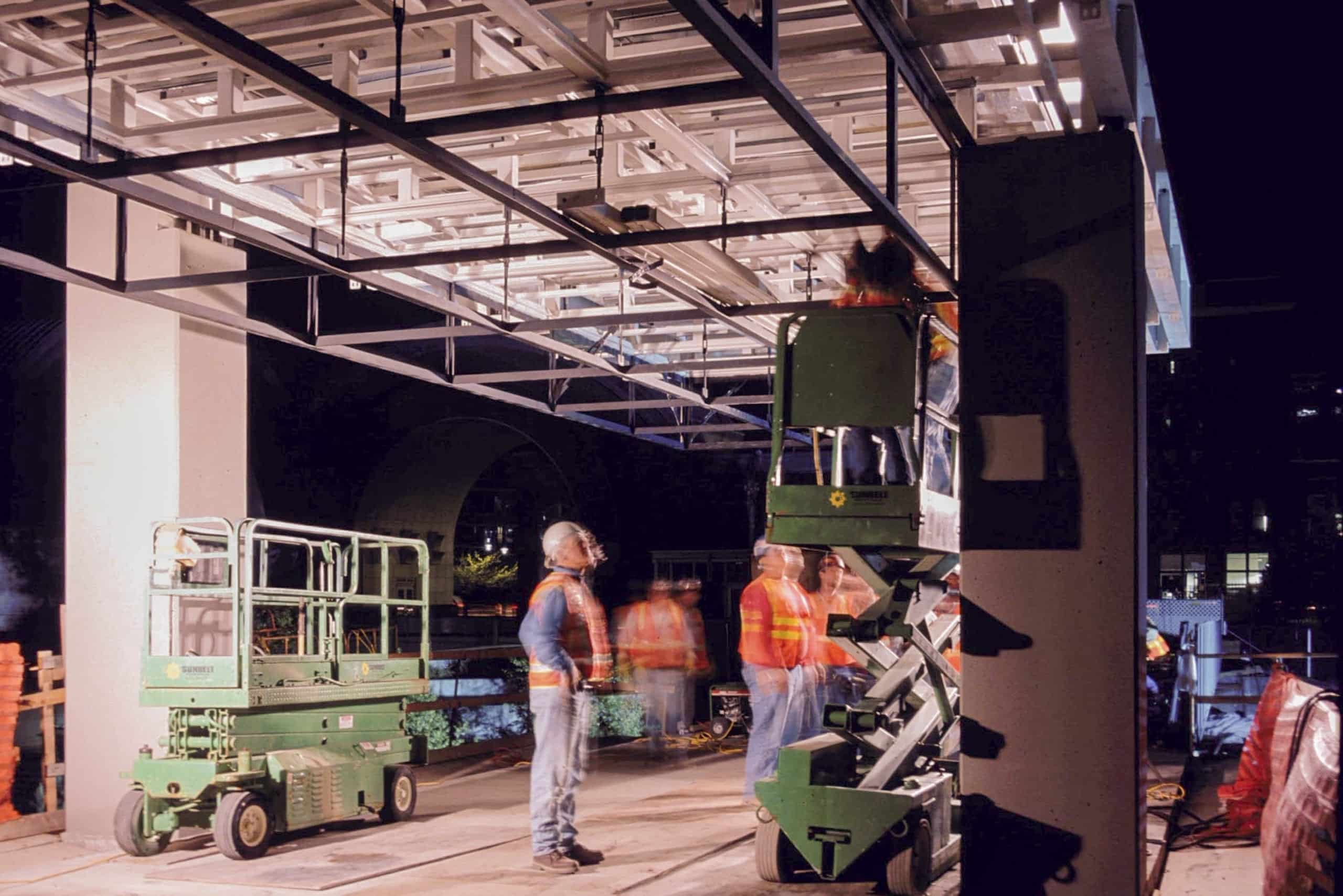 Zahner field construction crew installs the Seaform Pavilion for the Chihuly Bridge of Glass