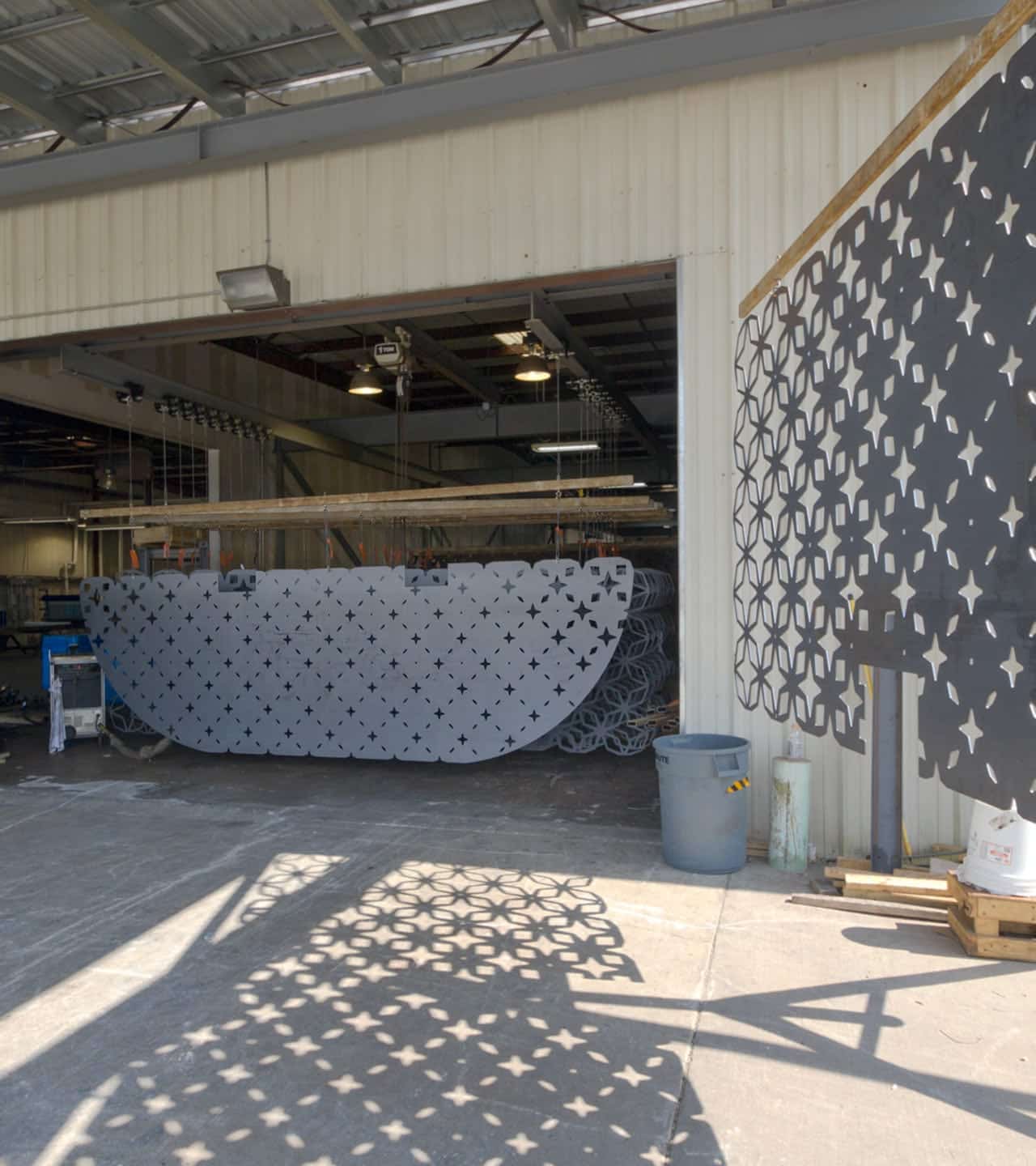 Raw weathering steel plates are prepared for patination process.
