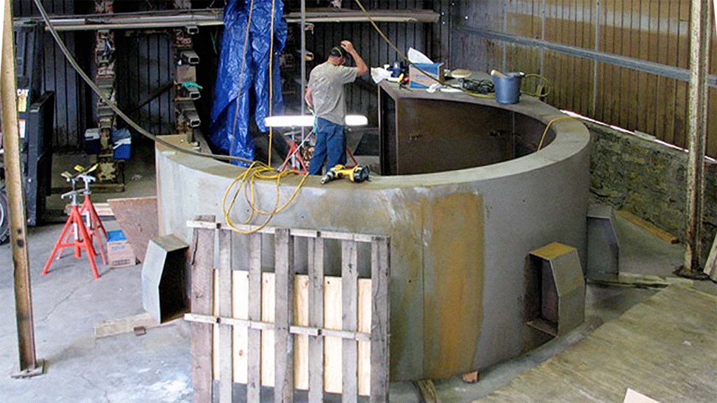 Zahner Fabricator assembles the sections of the Oakley HQ Desk.