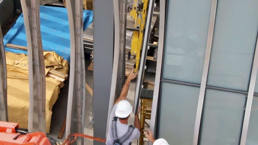 Zahner Installers install the glass panels.