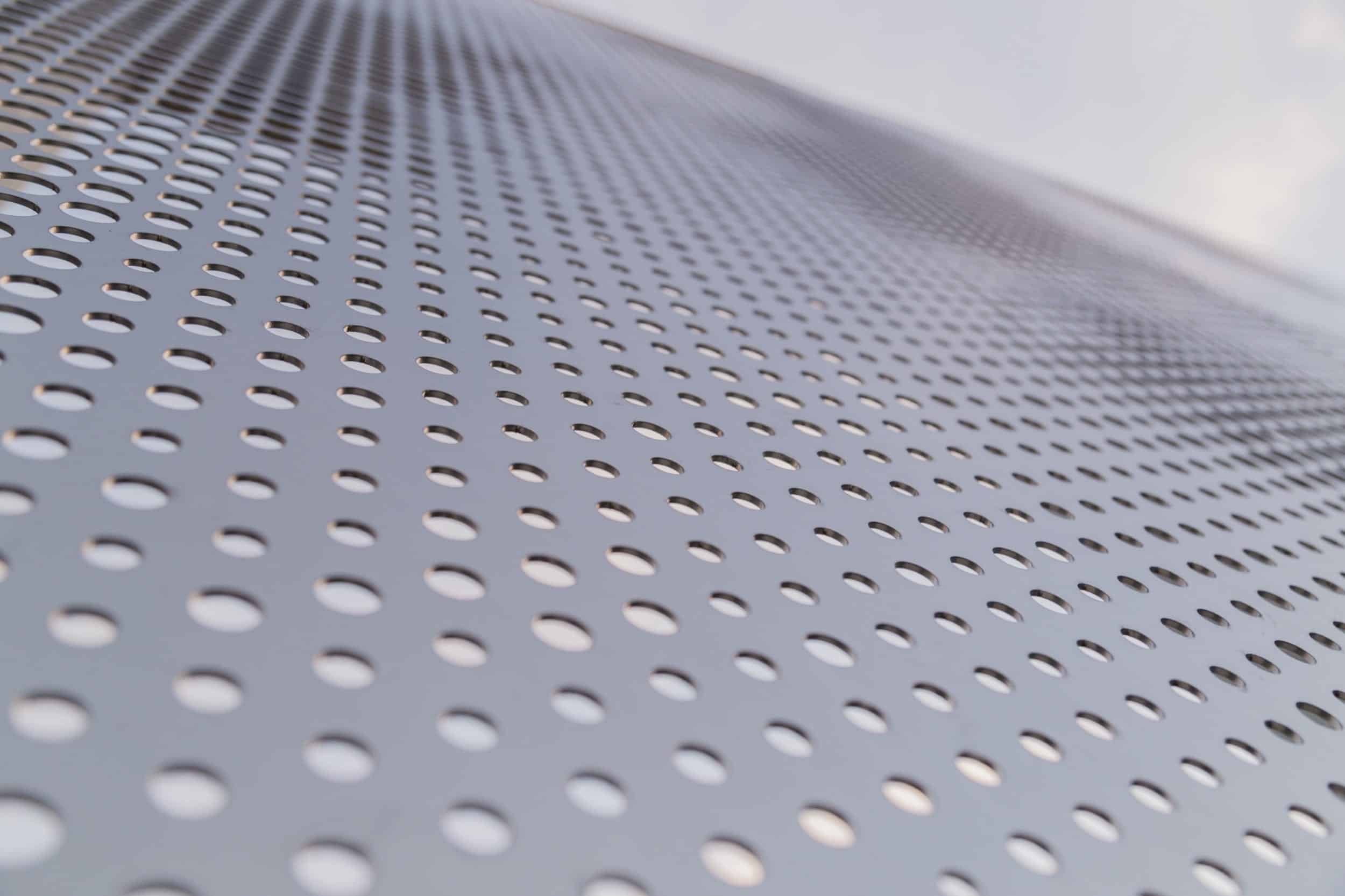 Angel hair stainless steel screens depicting the school's mascot.