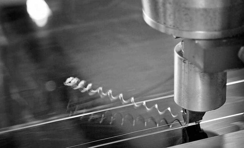 PHOTOGRAPHS OF THE HOW RADIUS REDUCTION USED IN THE PANEL FORMING PROCESS FOR PRECISE, MITERED AESTHETIC.